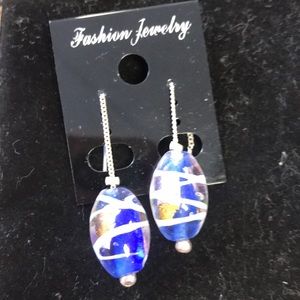 Handmade glass bead earrings for pierced ears on a silver thread